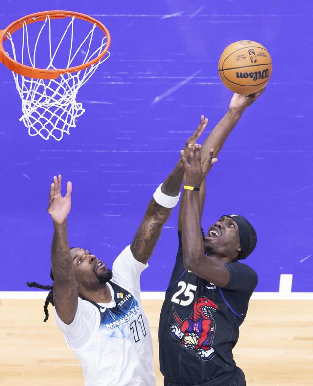 （体育）篮球——NBA常规赛：猛龙胜森林狼-7.jpg
