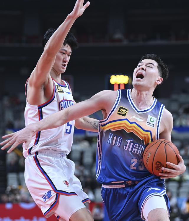 （体育）篮球——CBA常规赛：新疆伊力特胜天津先行者-13.jpg