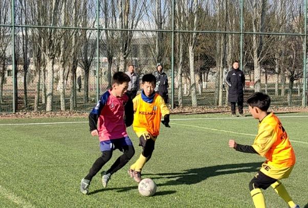 10年足球之约 内蒙古草上飞踢球贺岁-5.jpg